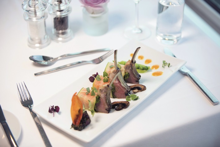 A gourmet duck dish with orange sauce in the restaurant on an Emerald Liberte river cruise