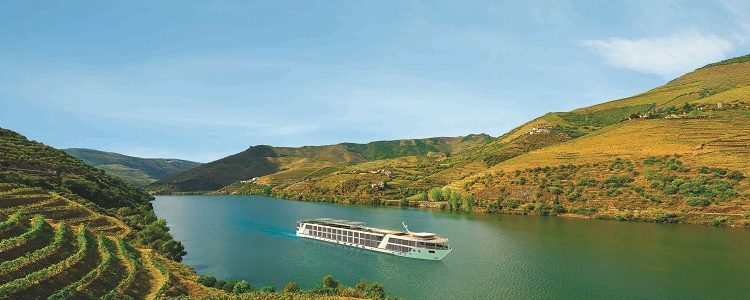 Emerald Waterways' Emerald Radiance cruise ship sailing down the lush Douro