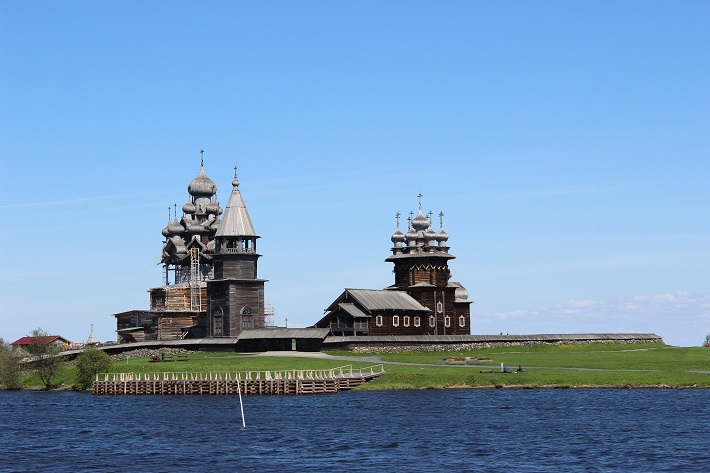 An ornate temple building on the banks of Lake Onega in Russia
